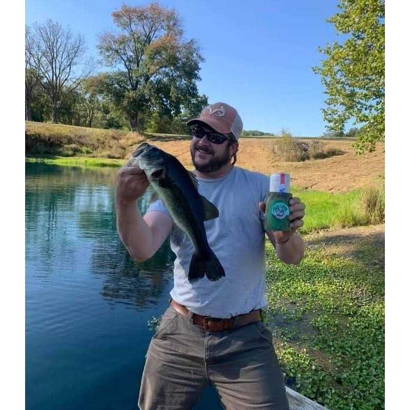 Chill-N-Reel Fishing Can Cooler Hard Shell Drink Holder with Hand Line Reel Attached