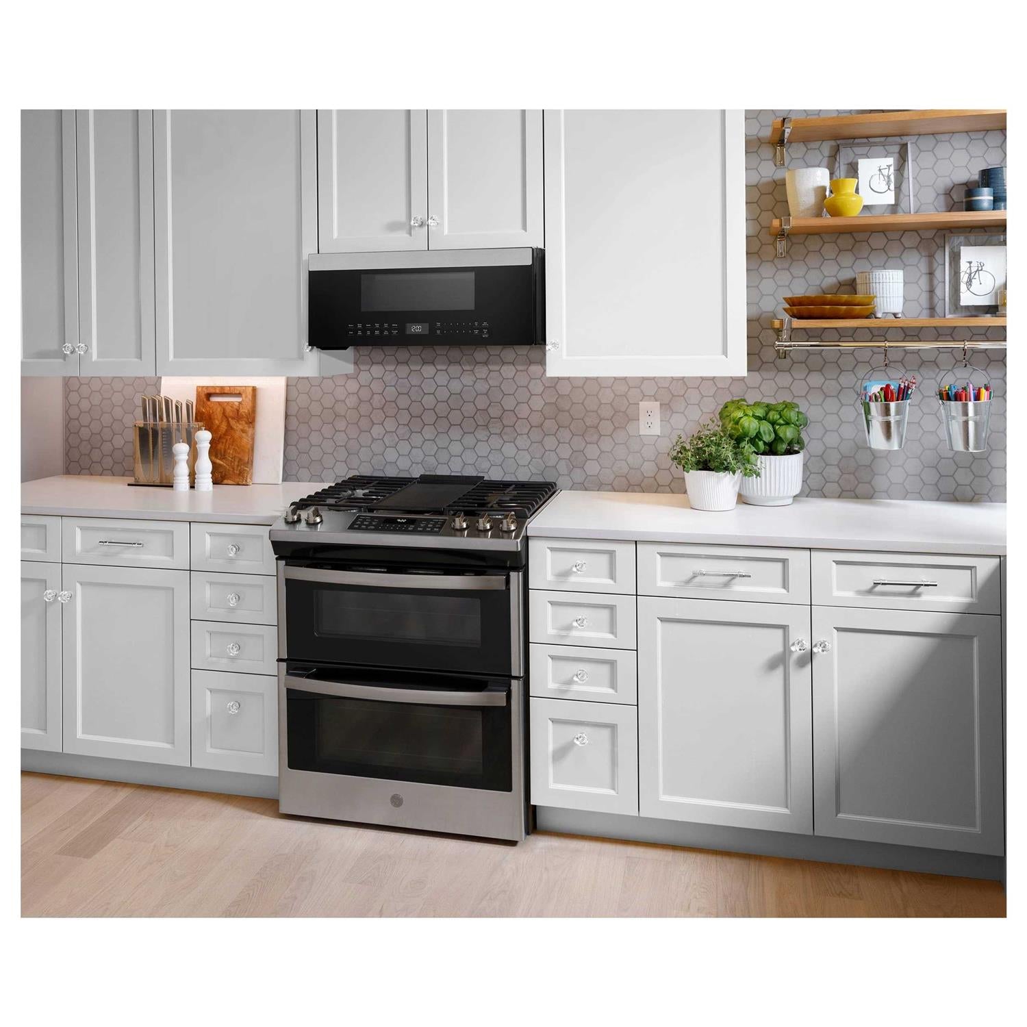 GE 1.2 Cu. Ft. Over-the-Range Low Profile Sensor Microwave Oven UVM9125STSS
